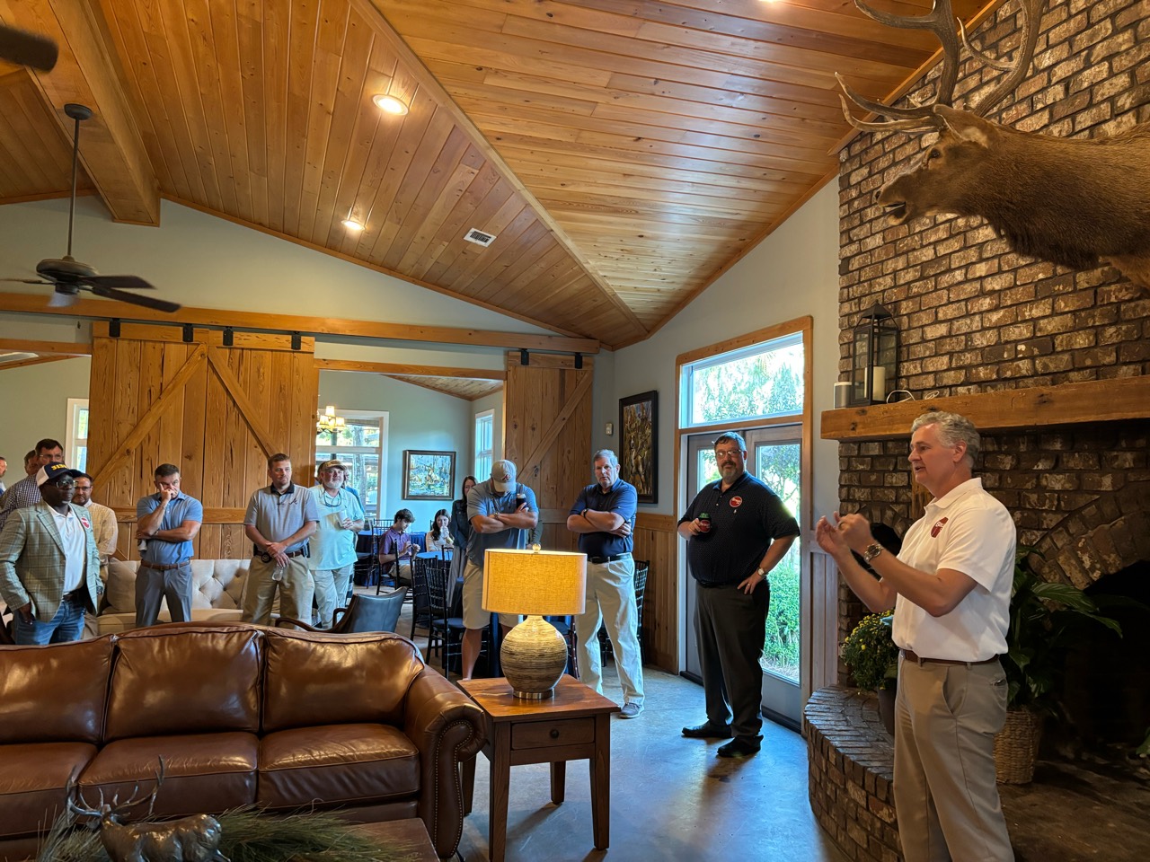 Richard Braun speaking with supporters at a campaign gathering.